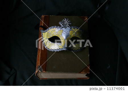 Venetian mask and old book 11374001