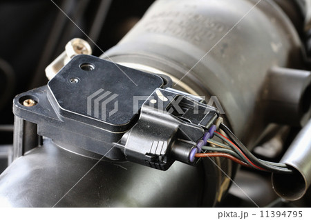 An automobile engine with twin carburettors and air filters An automobile engine with twin carburettors and air filters 11394795