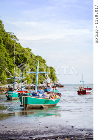 Small fishing boat at the coast 11395017