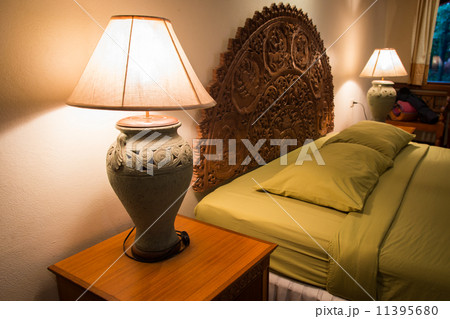Lamp head of the bed in the bedroom 11395680