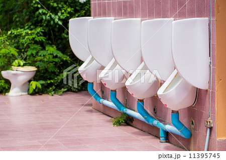 white porcelain urinals 11395745