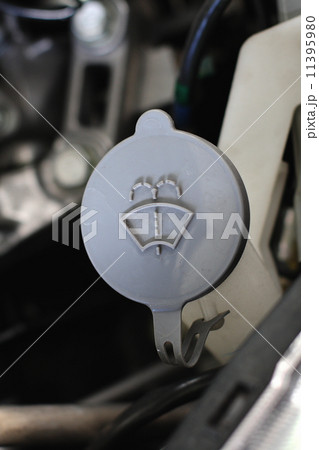gray liquid caps inside a car engine gray liquid caps inside a car engine 11395980