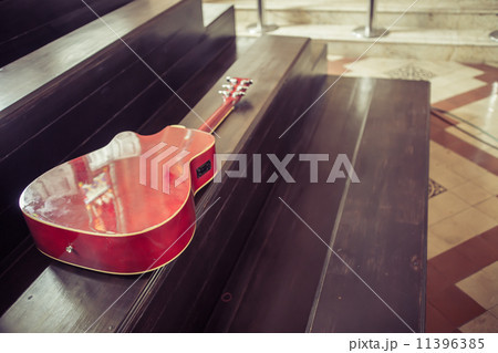 Guitar rests on the seat 11396385