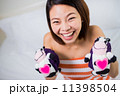 Beautiful Asian woman with a pretty smile. 're Happy with pregna 11398504