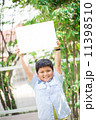 teen boys and girls, showing blank placard board to write it on 11398510