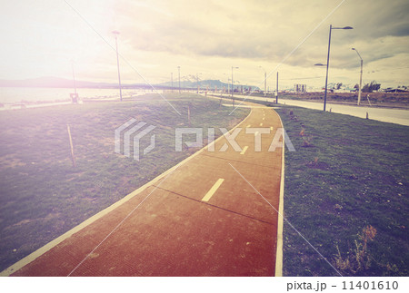 Vintage photo of bicycle lane along the harbour, Puerto Natales, 11401610