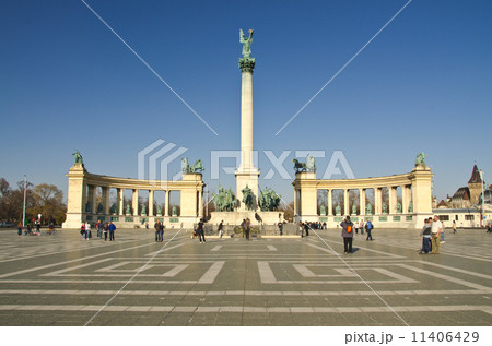 BUDAPEST - CIRCA MAR 2012: Tourists visit Millennium Monument in 11406429