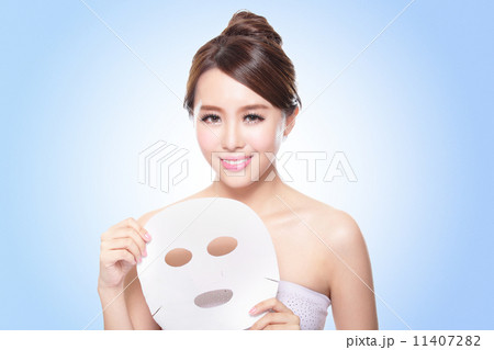 happy Young woman with cloth facial mask 11407282