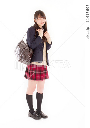お洒落なブレザーを着て立つ可愛らしい女子校生 お洒落なブレザーを着て立つ可愛らしい女子校生 11413693