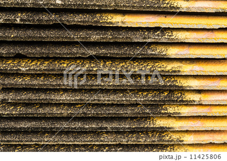 Piles of old roof tiles Piles of old roof tiles 11425806