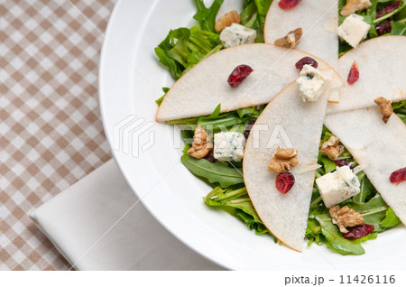 Fresh pears arugula gorgonzola cheese salad Fresh pears arugula gorgonzola cheese salad 11426116