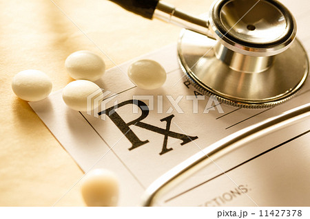 Stethoscope and pills 11427378