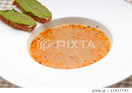 Italian minestrone soup with pesto crostini on side Italian minestrone soup with pesto crostini on side 11427747