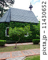 small chapel with green trees 11430652