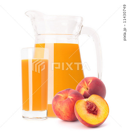 Peach fruit juice in glass jug Peach fruit juice in glass jug 11430749