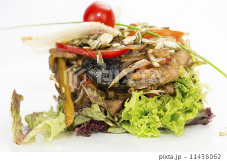 salad with vegetables and meat on a white background in the restaurant salad with vegetables and meat on a white background in the restaurant 11436062