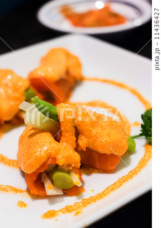 Cucumber Roll with Salmon and shrimp sauce containing egg. Cucumber Roll with Salmon and shrimp sauce containing egg. 11436427