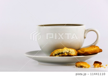 white cup of coffee with cookies white cup of coffee with cookies 11441110