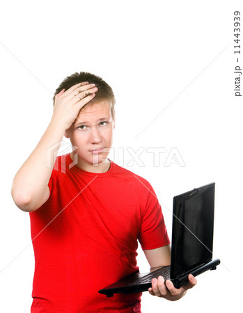 The teenager with the laptop. Was tired of problems. The teenager with the laptop. Was tired of problems. 11443939