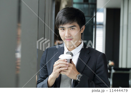 Businessman drink a cup of coffee Businessman drink a cup of coffee 11444479
