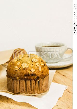 Almond muffins with coffee cup on wood table 11445233
