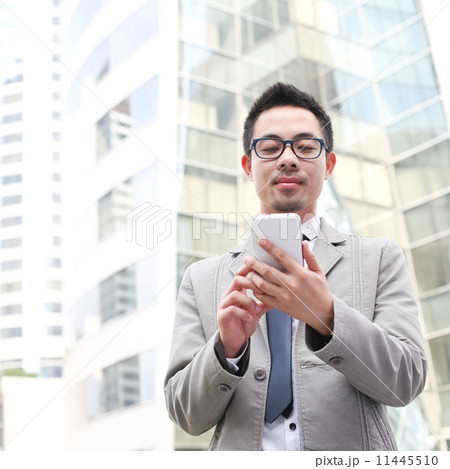 Asian Business Man With A Tablet Computer 11445510