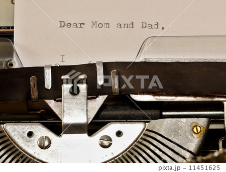 Text Dear Mom and Dad typed on old typewriter 11451625