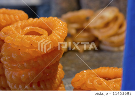 Close-up of delicious jalebis for sale Close-up of delicious jalebis for sale 11453695