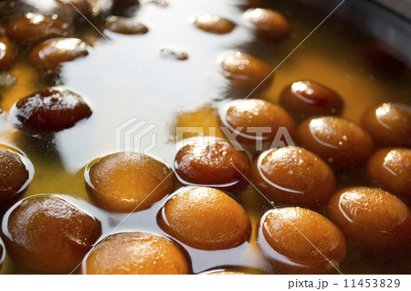 Gulab jamuns in syrup displayed at stall 11453829