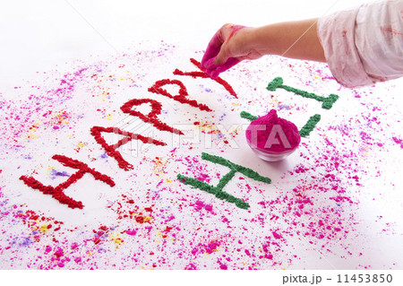 Hand writing HAPPY Holi with gulal over white background Hand writing HAPPY Holi with gulal over white background 11453850