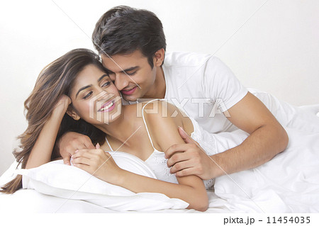 Romantic young couple in bedroom 11454035