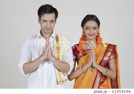 Portrait of South Indian couple greeting 11454148