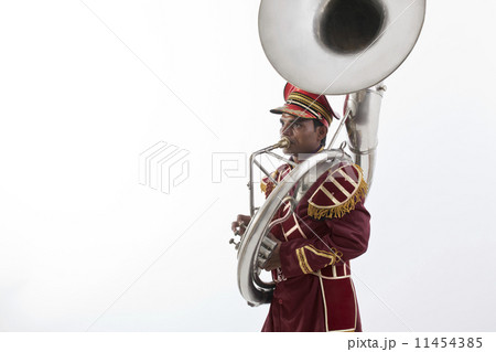 Bandmaster playing a sousaphone 11454385