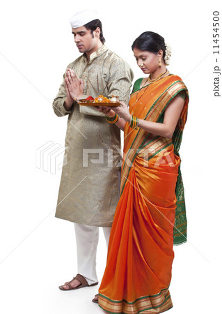 Maharashtrian couple praying Maharashtrian couple praying 11454500