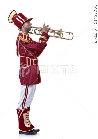 Bandmaster playing on a trumpet Bandmaster playing on a trumpet 11455301