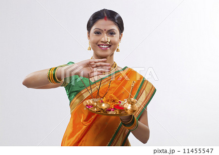 Portrait of a Maharashtrian woman holding a puja thali 11455547