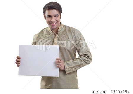Portrait of a Bengali man holding a white placard 11455597