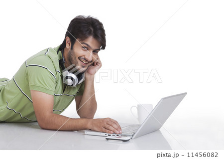 Young man working on laptop Young man working on laptop 11456082