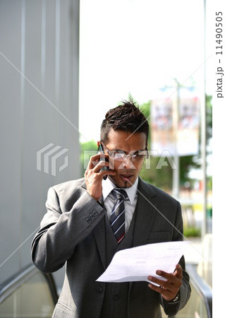 Businessman reading document 11490505