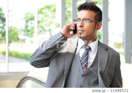 Businessman using phone Businessman using phone 11490521