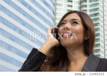 Business woman calling to connect Business woman calling to connect 11491522