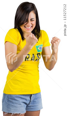 Excited football fan in brasil tshirt 11527212
