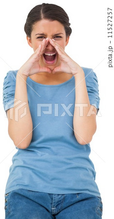 Pretty young casual brunette shouting 11527257
