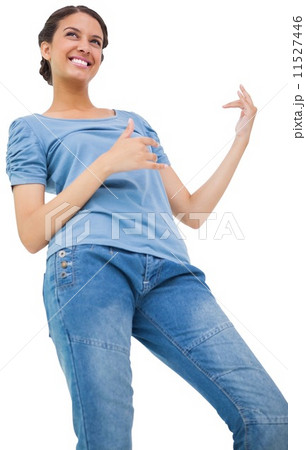 Pretty brunette playing air guitar 11527446