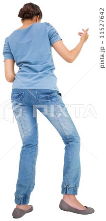 Pretty brunette playing air guitar 11527642