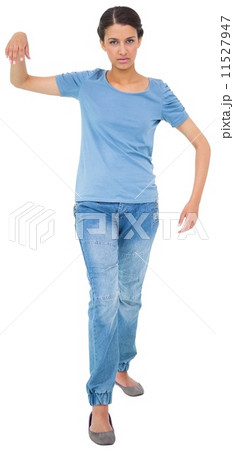 Powerless brunette in jeans and tshirt 11527947