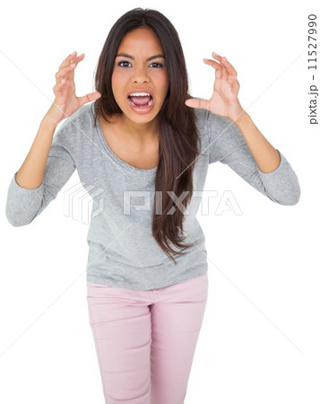 Angry casual young brunette shouting 11527990