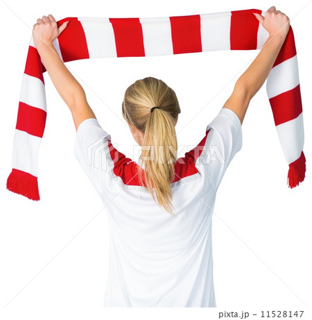 Pretty football fan in white cheering 11528147