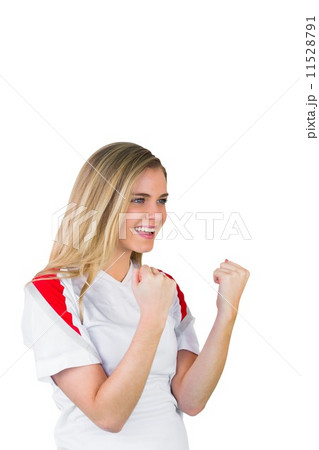 Pretty football fan in white cheering Pretty football fan in white cheering 11528791