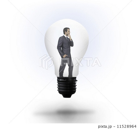 Thinking businessman in light bulb 11528964